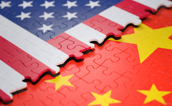 US and China flags as puzzle pieces