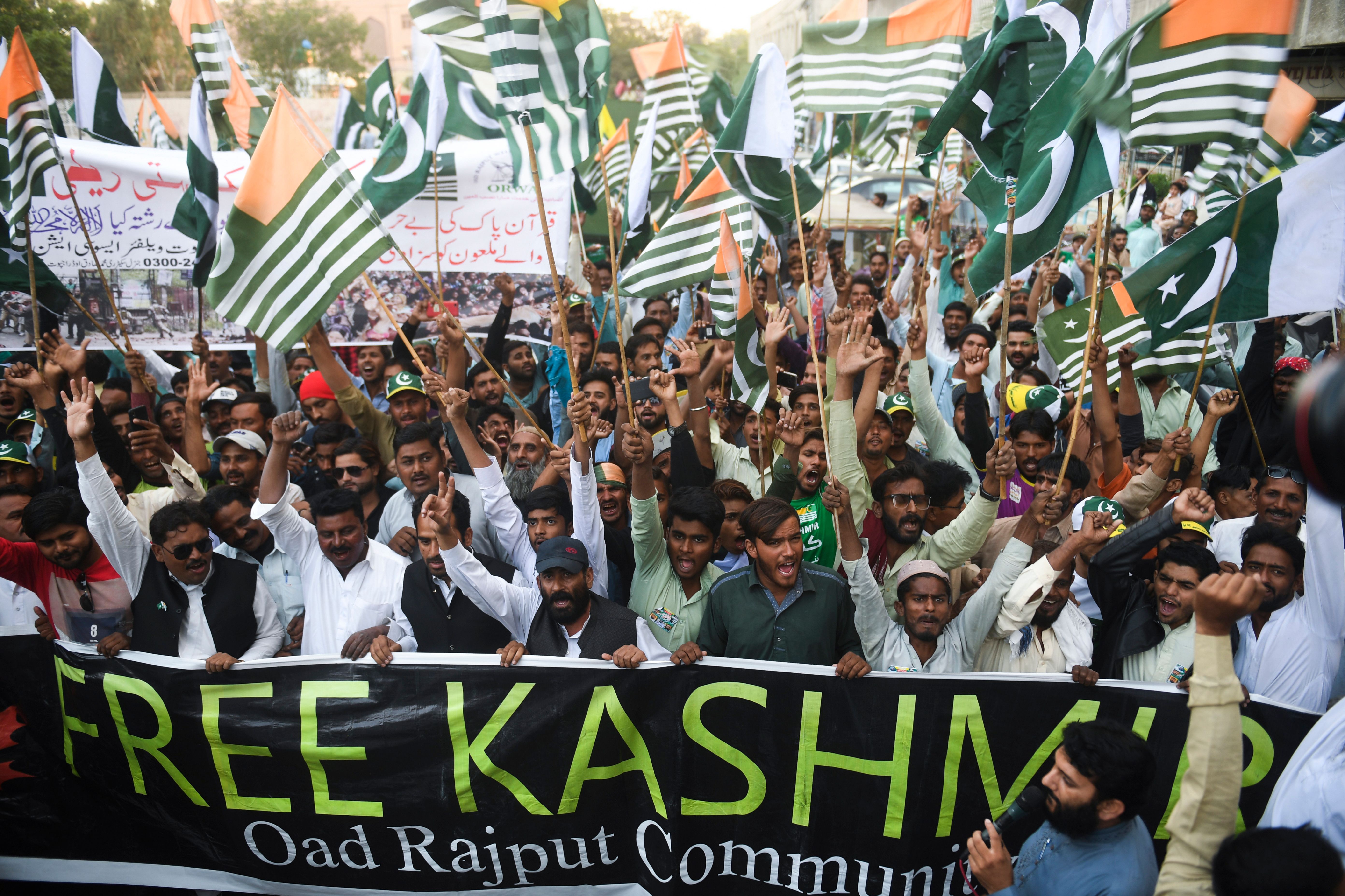 Pakistani youths shout anti-Indian slogans during a demonstration in Karachi