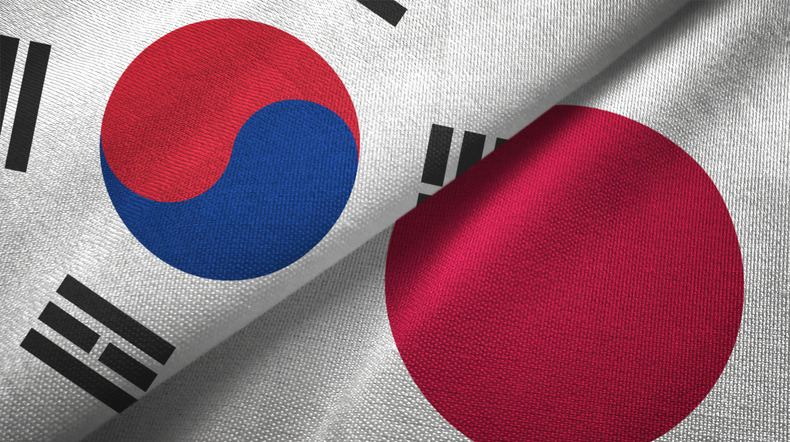 Japan and South Korea two flags together textile cloth fabric texture