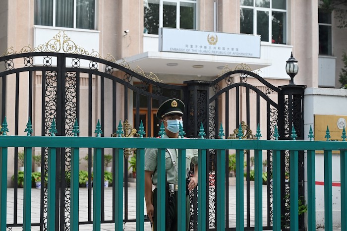 Chinese guard outside Afghan embassy in Beijing