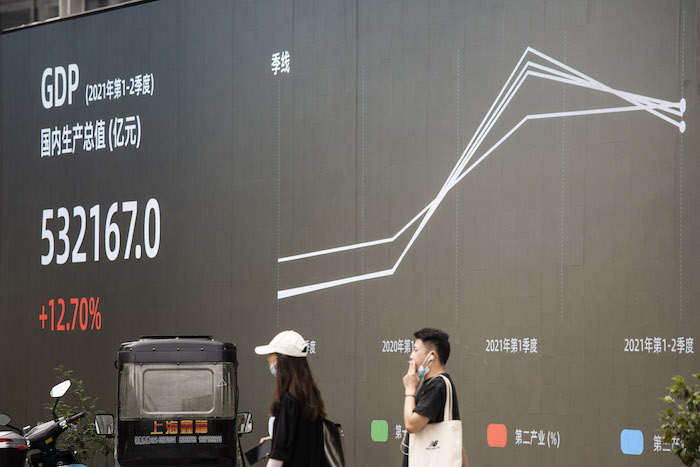 Public billboard shows China's growing GDP