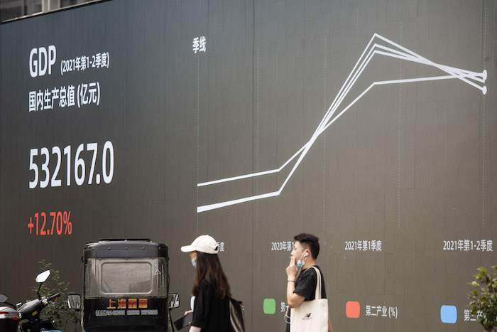 Public billboard shows China's growing GDP