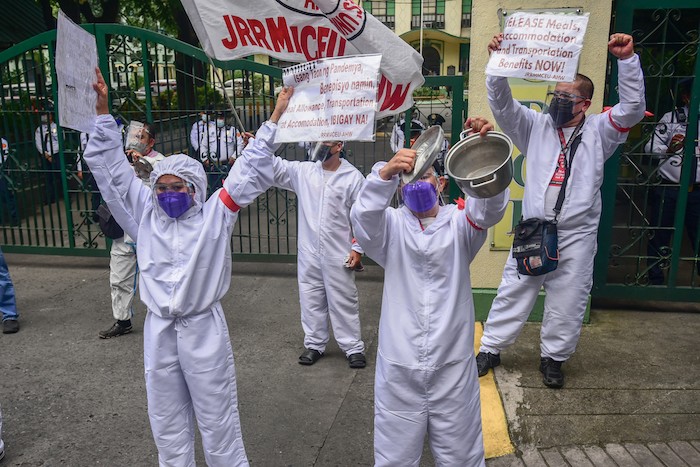 Philippine health workers at protest in 2021