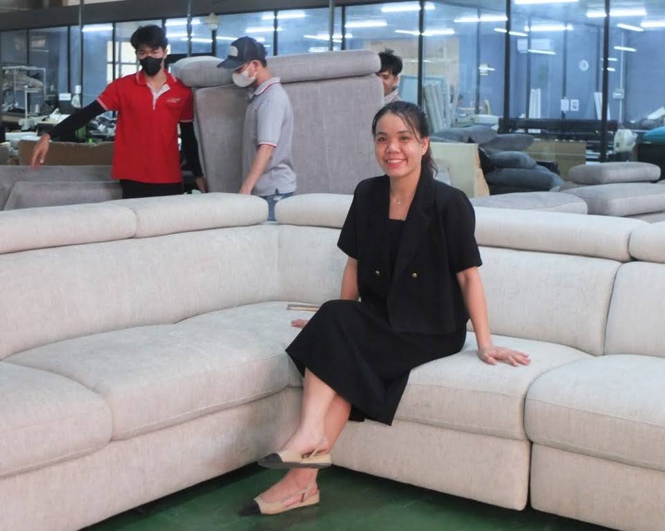 Bella Le, head of export sales at USofa, a Ho Chi Minh City-based sofa manufacturer, says Canadian wood products are too expensive for manufacturers like hers. Photo by Daisy Xiong