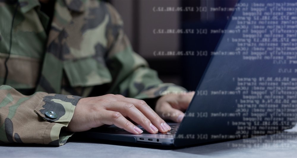 Defence officer at cyber computer 