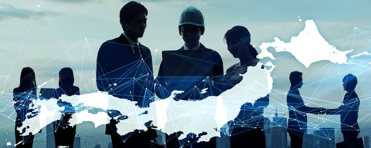 Executives in Japan with country map overlay 