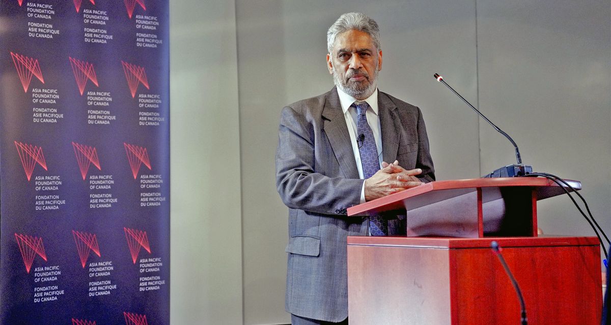 Raja Mohan at podium during presentation