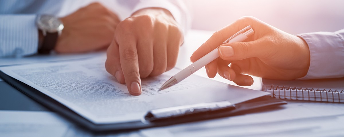 businesspeople viewing documents