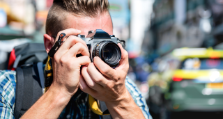 Journalist with camera 