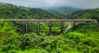 Igatpuri Indian Railway Train crossing in India