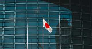 Japan flag in front of office building