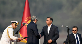 Bangladesh's newly sworn-in Prime minister Tarique Rahman (2R) shakes hands with President Mohammed Shahabuddin during a swearing-in ceremony at the National Parliament building in Dhaka on February 17, 2026. | Photo: Munir Uz Zaman / AFP via Getty Images
