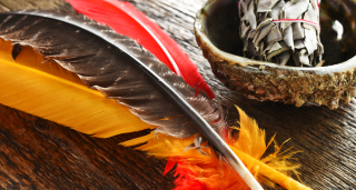 Indigenous feathers and smudge pot