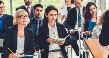 businesspeople attending workshop