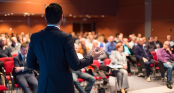 businesspeople attending seminar