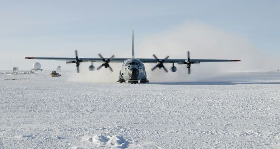 Military plane on snow covered ice 
