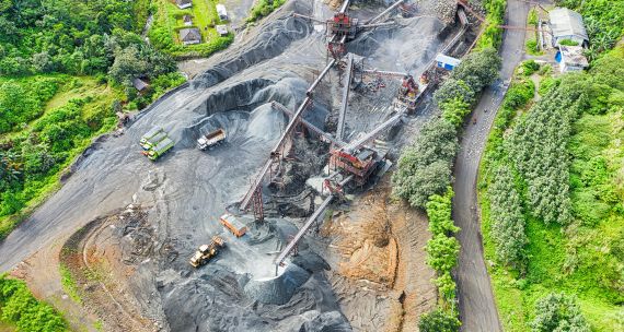 Quarry with mining machines in Indonesia