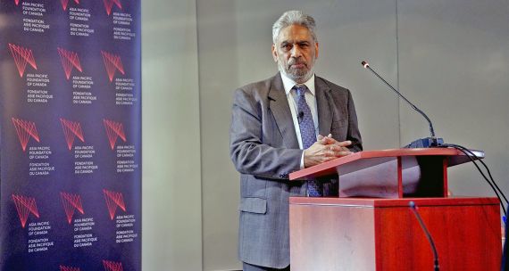 Raja Mohan at podium during presentation