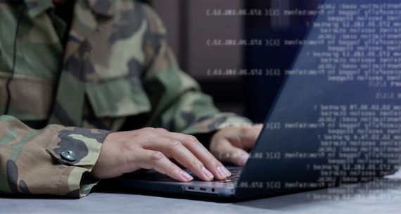 Defence officer at cyber computer 