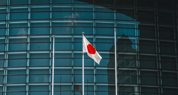 Japan flag in front of office building
