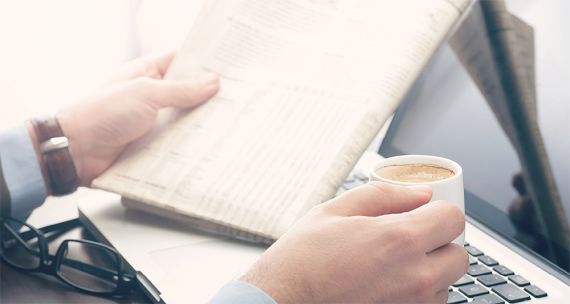 man reading newspaper