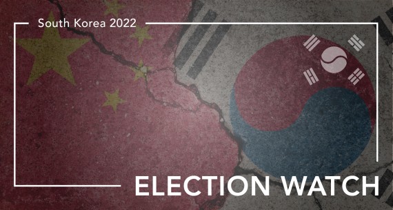 China and South Korea flags on cracked concrete with banner for Election Watch
