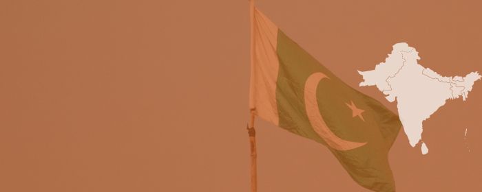 Pakistan flag on banner with map