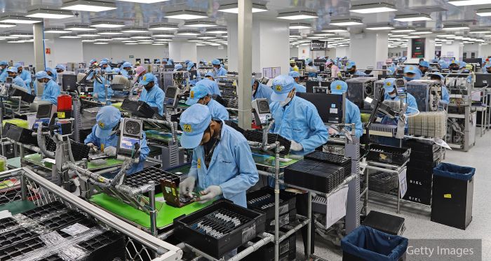 Mobile phone factory workers in Nodia, India