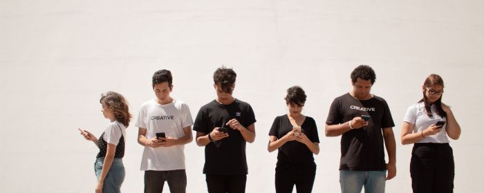 Young people on personal devices