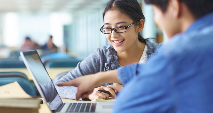 students working at computer